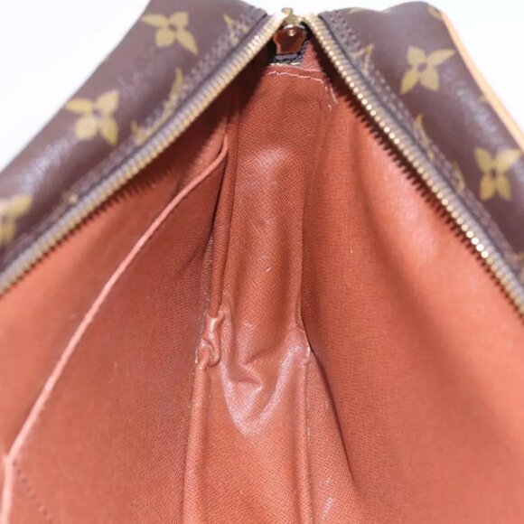 authenticity guaranteed LOUIS VUITTON Monogram Compiegne Clutch Bag - Picture 8 of 16